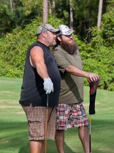 Hacksaw Schofield and Mr. October Fisher share a delicate moment at Thursday's Masters practice area.
